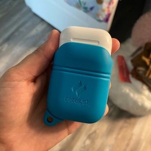 Airpods with blue case